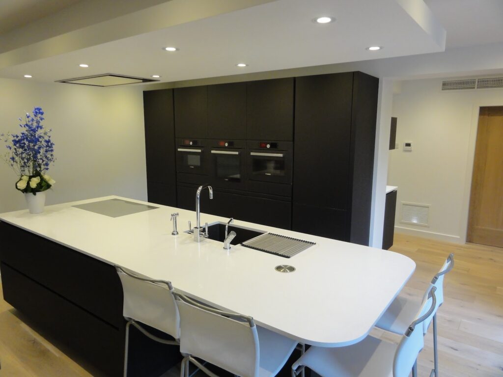 Mr & Mrs Franks - 2012 - Satin Glass kitchen in Terra Brown matt glass with White Silestone worktops