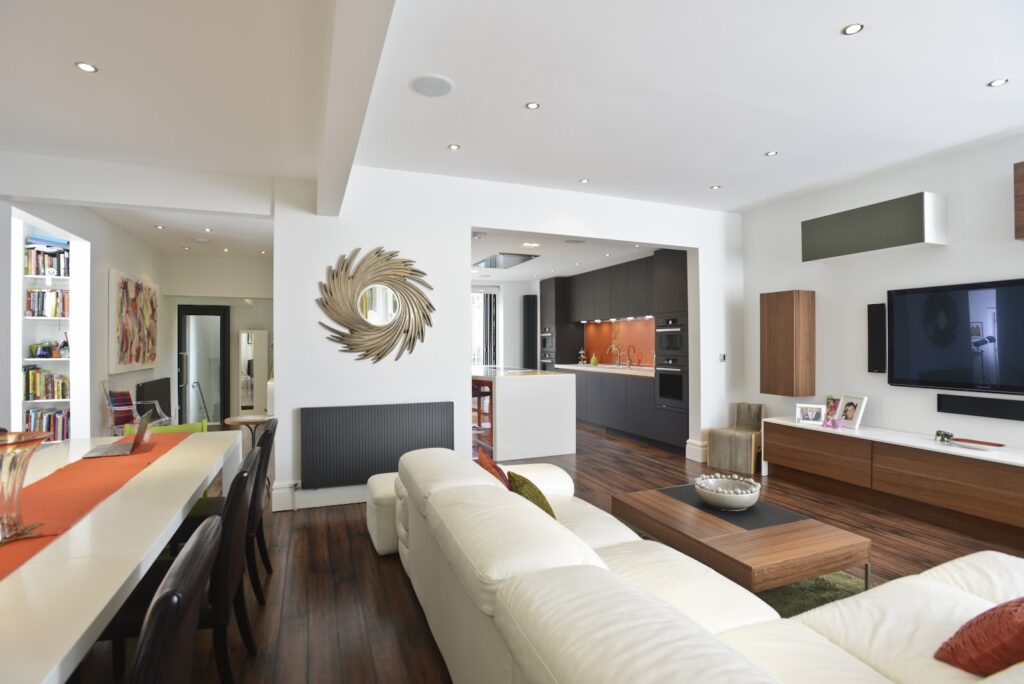 Mr & Mrs Jacobson - AWARD WINNER DECEMBER 2012 - Satin glass Kitchen in Terra brown matt glass & Corian worktops